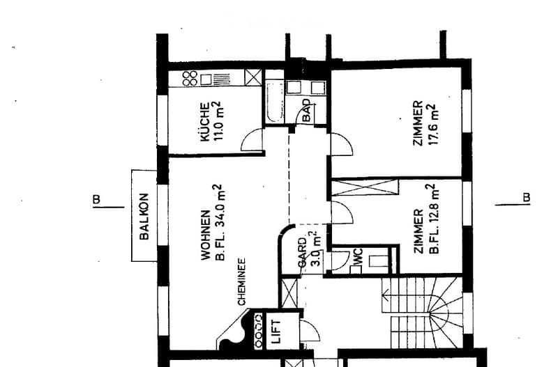 Floor plan showing a kitchen, living room, two bedrooms, bathroom, balcony, and a small garden area.