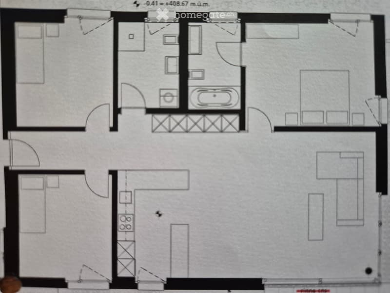 Floor plan showing a two-story layout with multiple rooms including bedrooms, bathrooms, and a living area.