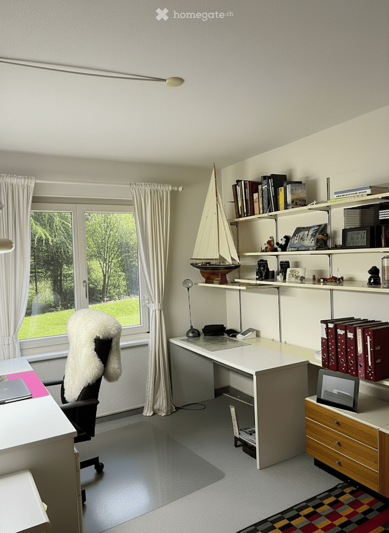 white desk, office chair, rug, bookcase with various items, white curtains, large windows
