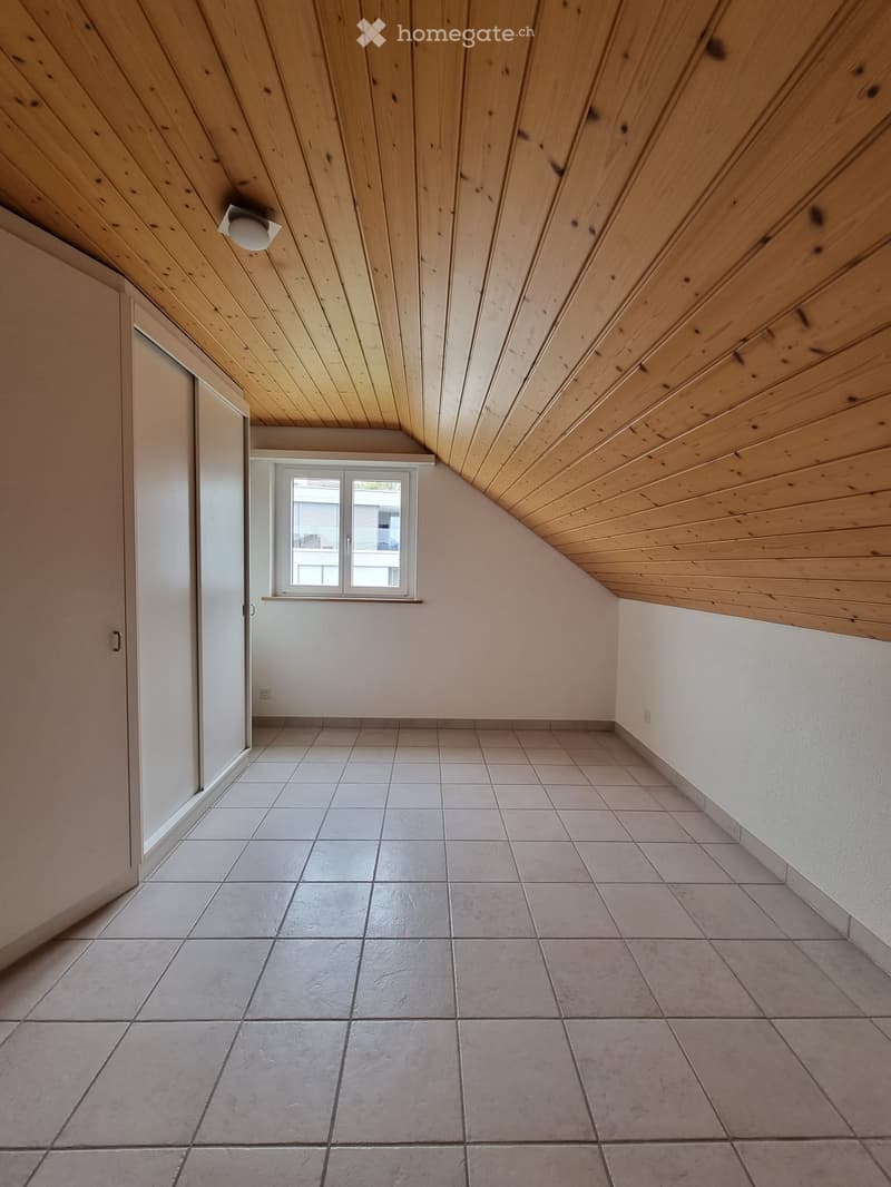 empty room, white tiles, wooden ceiling, small window, white wall, ceiling lamp