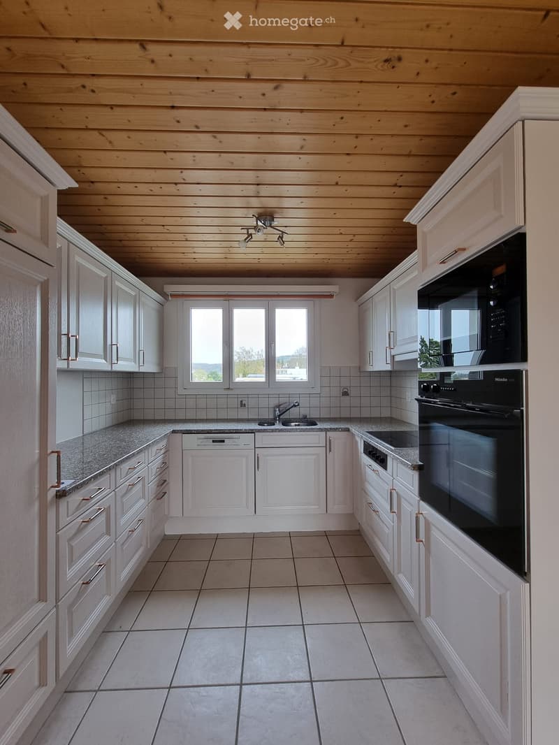 modern kitchen, white cabinets, tiled floor, ceiling lights, granite countertop, sink, oven, dishwasher