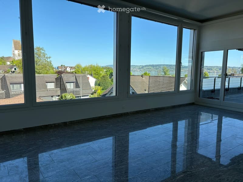 large windows, tiled floor, empty room, view of the city