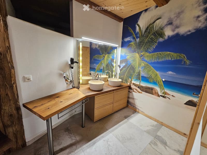 3 sinks, wooden countertop, wall mirror, beach themed mural, power outlet, wooden cabinets, wooden flooring
