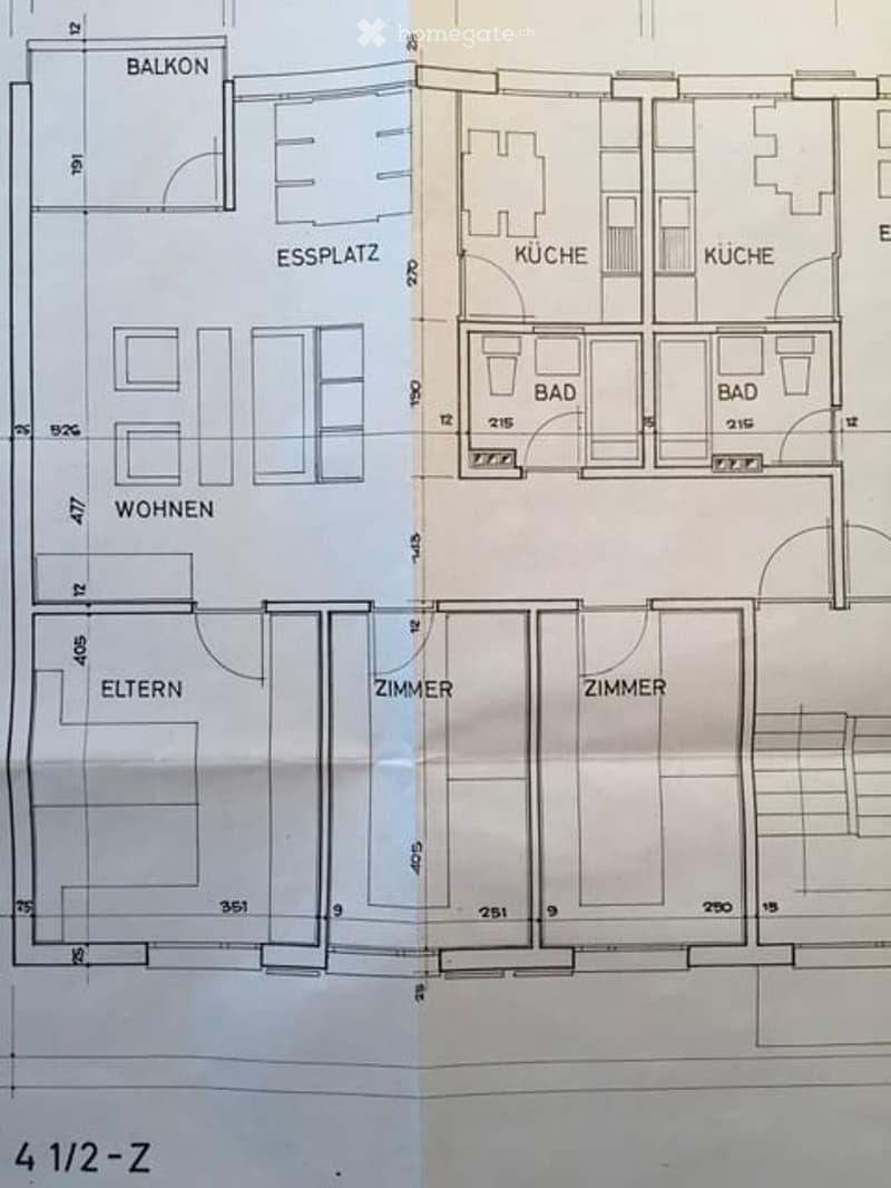 Floor plan showing a multi-room layout including a balcony, dining area, living area, bedrooms, bathrooms, and kitchen.
