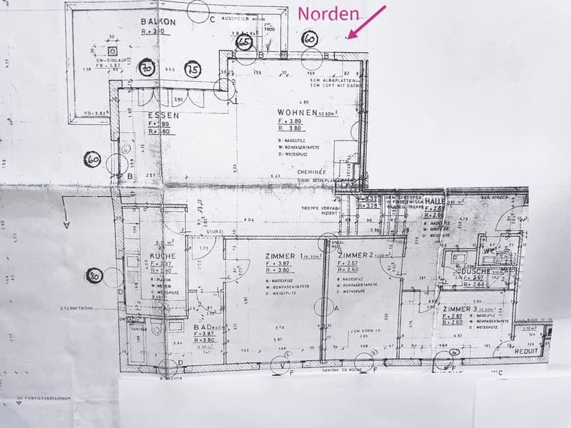 Floor plan showing a multi-room layout including a kitchen, living area, bedrooms, bathrooms, and a balcony.
