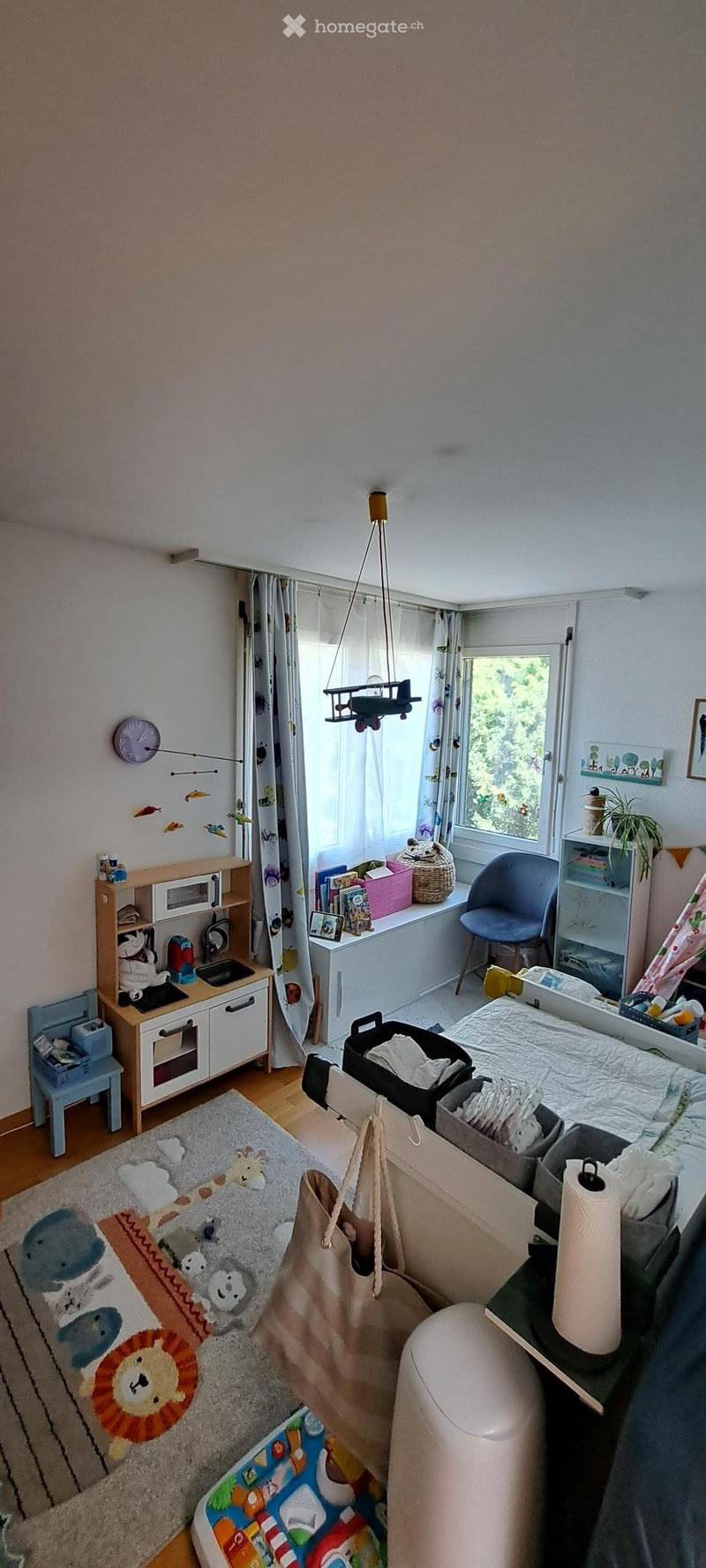 {"type": "Furnished Room", "objects": ["toy kitchen", "chair", "stool", "table", "curtain", "toy airplane", "clock", "picture frame", "plant", "basket", "books", "toy", "stool", "handbag", "diaper pail", "toy", "table", "toy", "toy", "toy", "toy", "toy",
