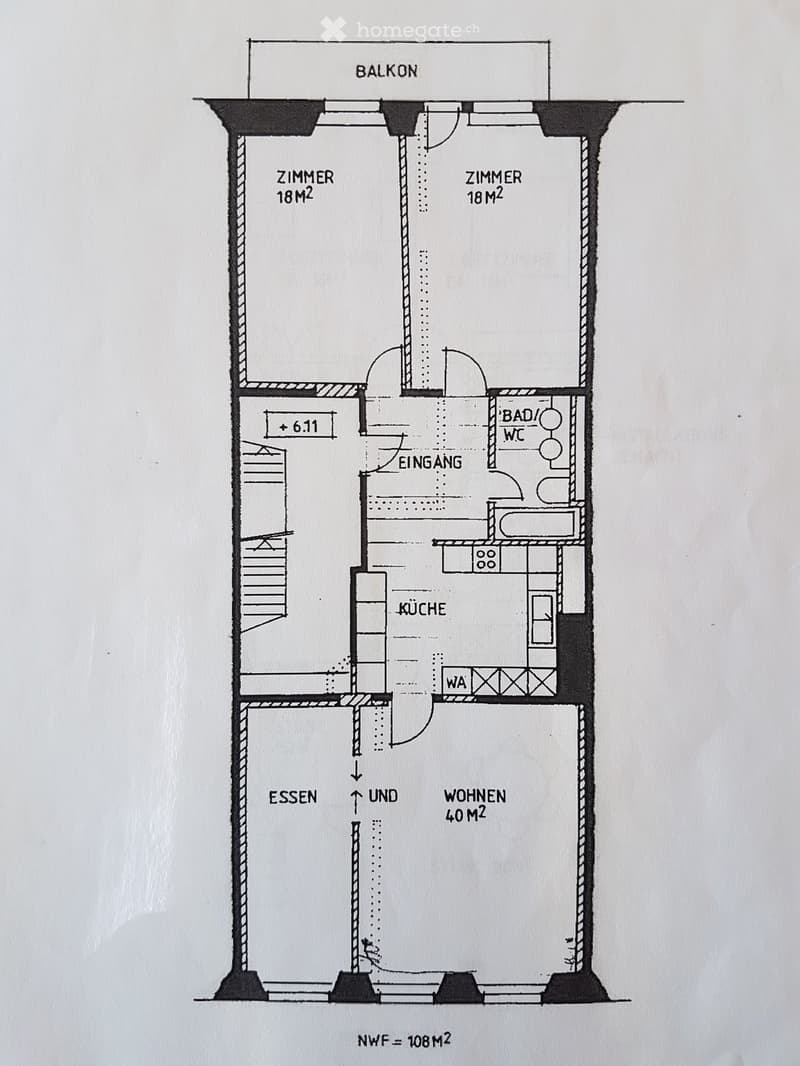 Floor plan of an apartment with a living area (40 m²), two bedrooms (18 m² each), kitchen, bathroom, and entrance. Includes a balcony.