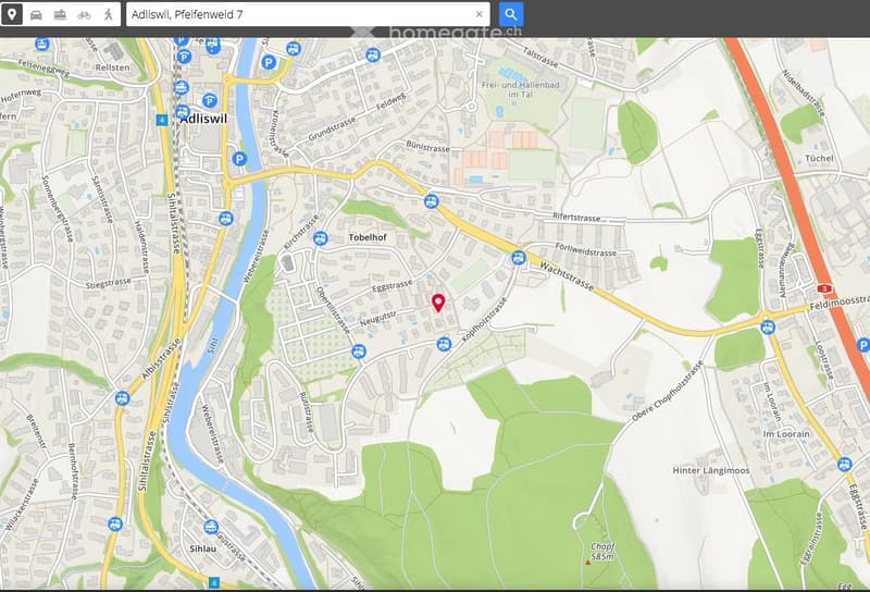 Map view of a residential area with streets, buildings, and green spaces.
