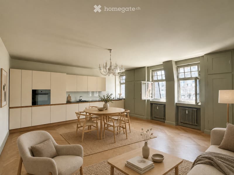 Open-plan living and dining area with light wood flooring, cream-colored cabinets, a chandelier, and a mix of seating and dining furniture.