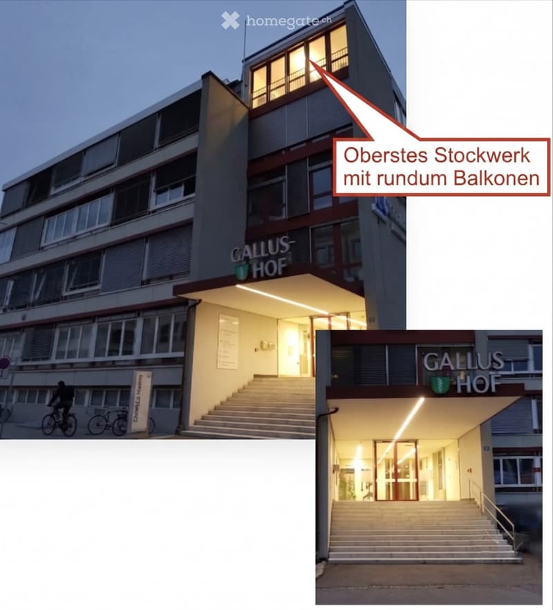 Multi-story building with modern design, large windows, illuminated entrance, and balconies on the top floor.