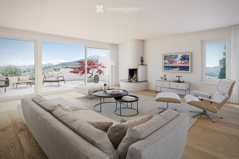 Modern living room with large windows offering a scenic mountain view, featuring a grey sofa, coffee table, chairs, a fireplace, and decorative items.