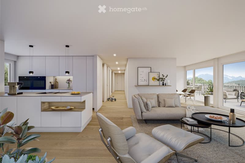 Modern open-plan living and dining area with a sofa, coffee table, and a kitchen island. The space features large windows with a scenic mountain view, wooden flooring, and contemporary decor.