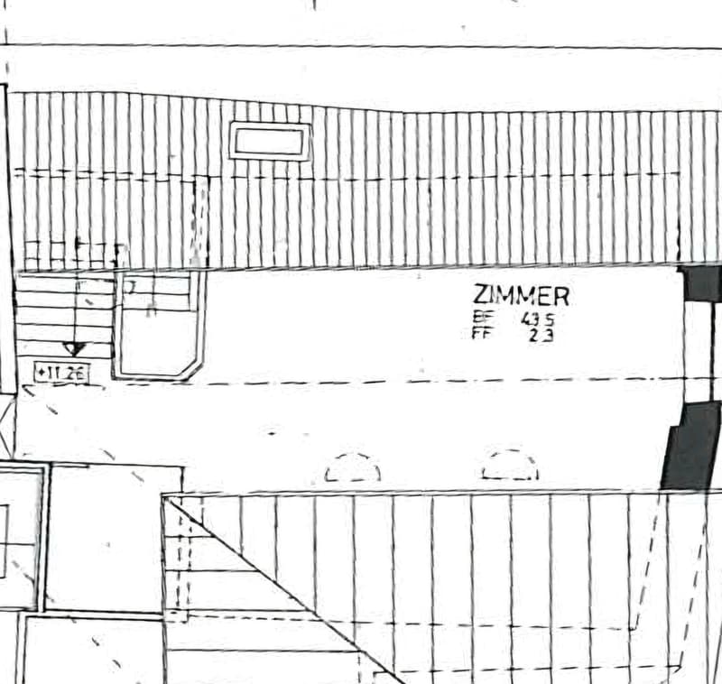Floor plan showing multiple rooms and spaces, including labeled areas and dimensions.