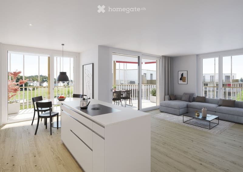 Modern open-plan living and dining area with a grey sectional sofa, coffee table, kitchen island with stove, dining chairs, and a balcony view.