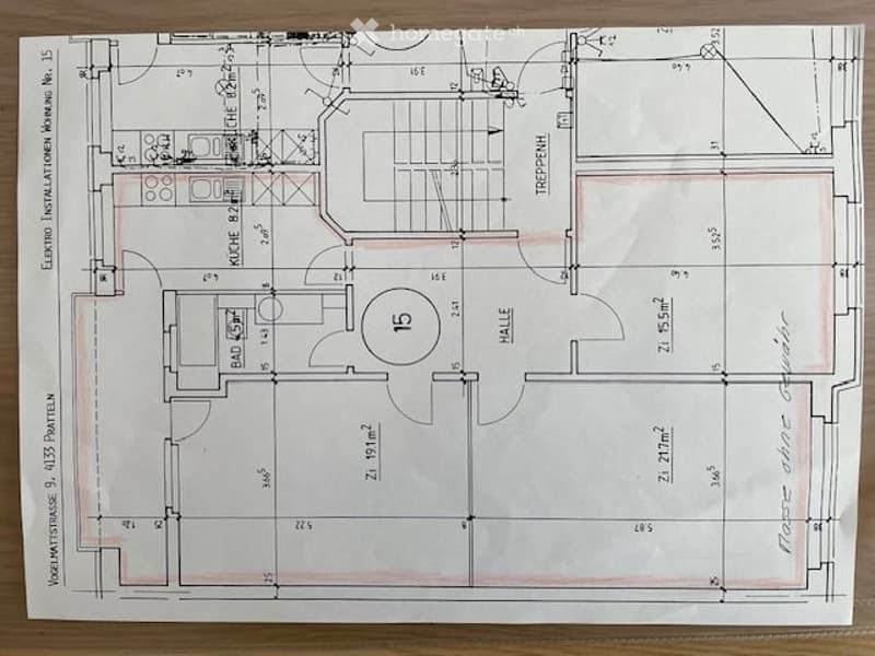 Floor plan of a residential space showing a kitchen, living room, hallway, and several rooms including a bedroom and a bathroom.