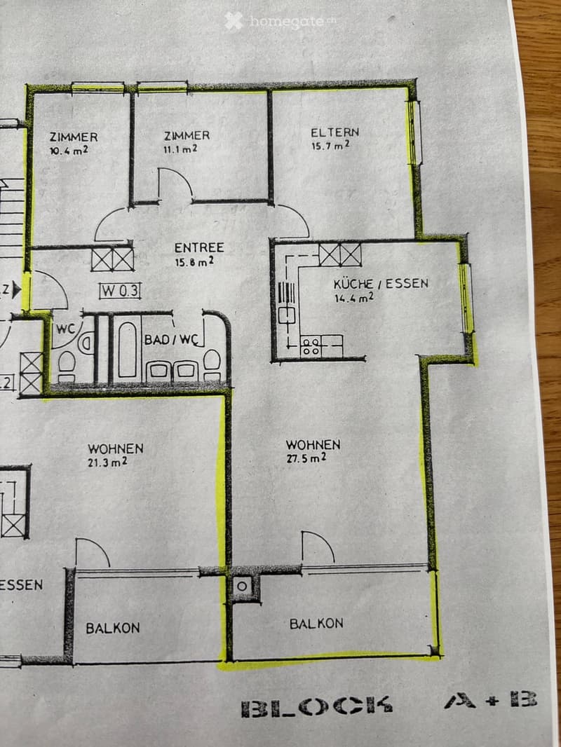 Floor plan showing a layout with multiple rooms including two bedrooms, a living area, a kitchen/dining area, a bathroom, and two balconies.