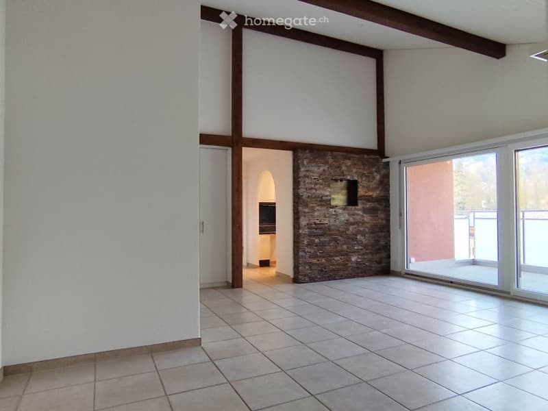 empty room, white walls, tiled floor, brick wall, sliding glass doors, balcony