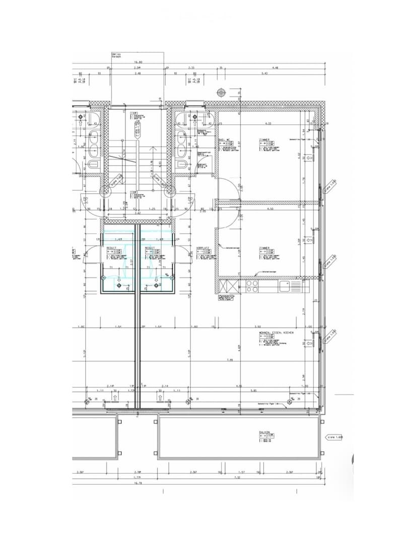 Floor plan of a residential unit showing two bathrooms, a kitchen, living area, and balcony.