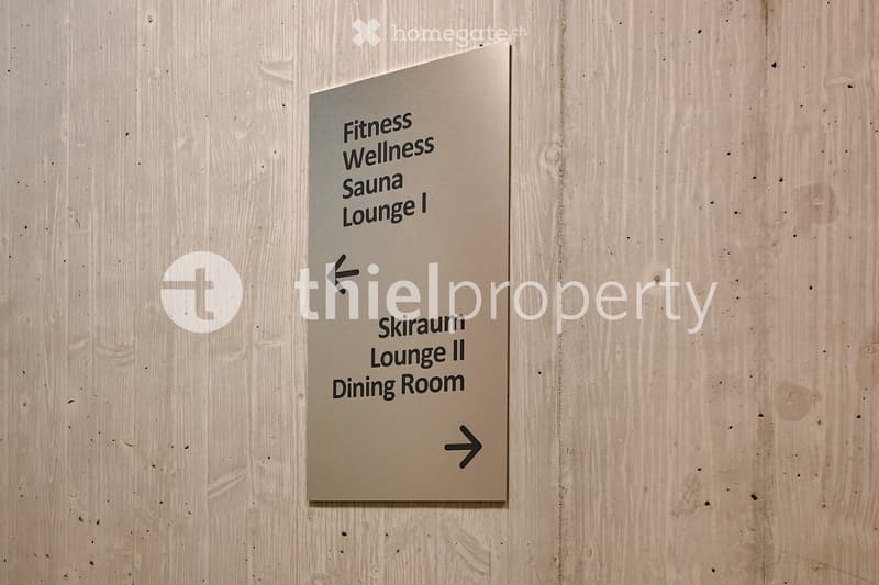 Facilities sign indicating fitness, wellness, sauna, lounge, and dining room.