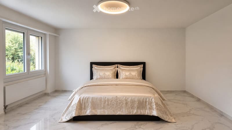 Modern bedroom with a large bed, decorative pillows, and a luxurious bedspread, large windows with a view of greenery, and a sleek round ceiling light.