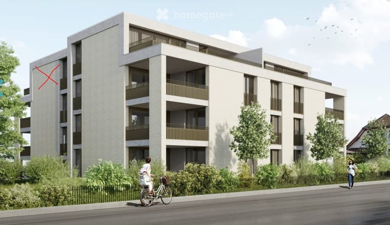 Modern multi-story apartment building with balconies, surrounded by greenery and a paved walkway.
