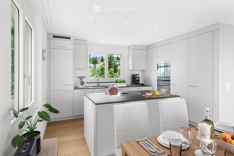 Modern kitchen with white cabinets, black countertop, island, and dining area. Features include a coffee maker, teapot, bowl, and various kitchen utensils on the counter and dining table.