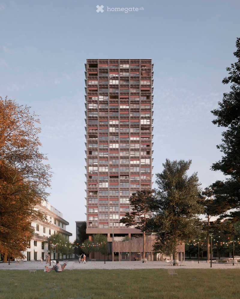 A modern, multi-story residential building with a grid-like facade of red and white panels, surrounded by a park area with trees, seating, and people relaxing.