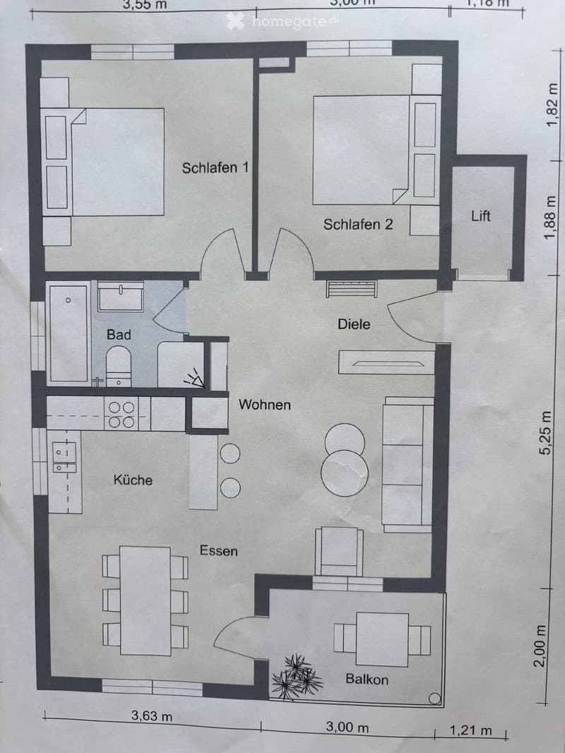 Floor plan showing a layout with a kitchen, living area, dining area, two bedrooms, a bathroom, and a balcony.