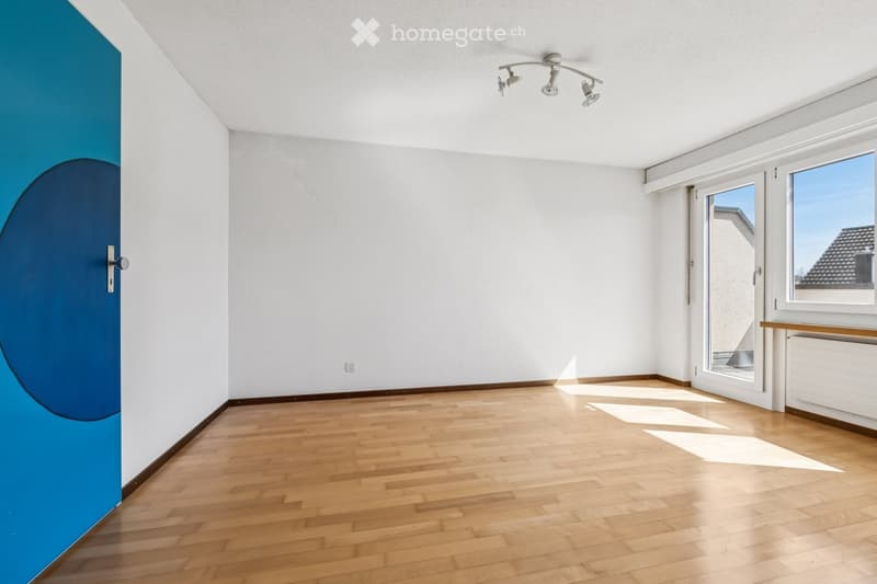 empty room, wooden floor, white walls, blue door, glass door, ceiling lights, power outlet