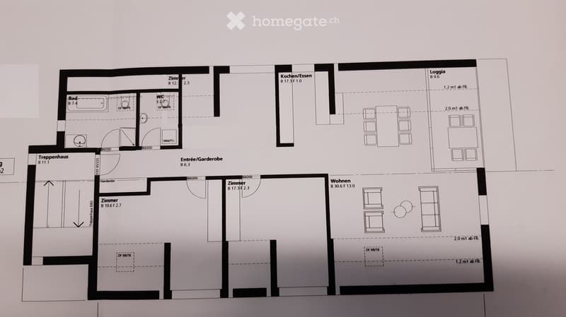 Floor plan of a residential unit showing a living area, kitchen, bedroom, bathroom, hallway, and balcony.
