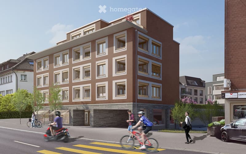 An apartment building with several floors, brown brick exterior, balconies on upper floors, underground garage.