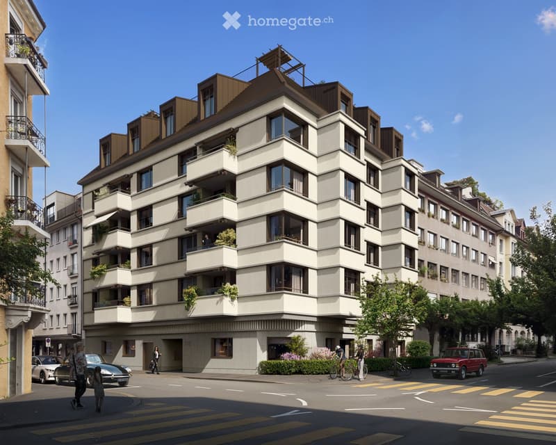 Modern multi-story residential building with balconies and large windows, located on a street corner with pedestrians and parked cars.