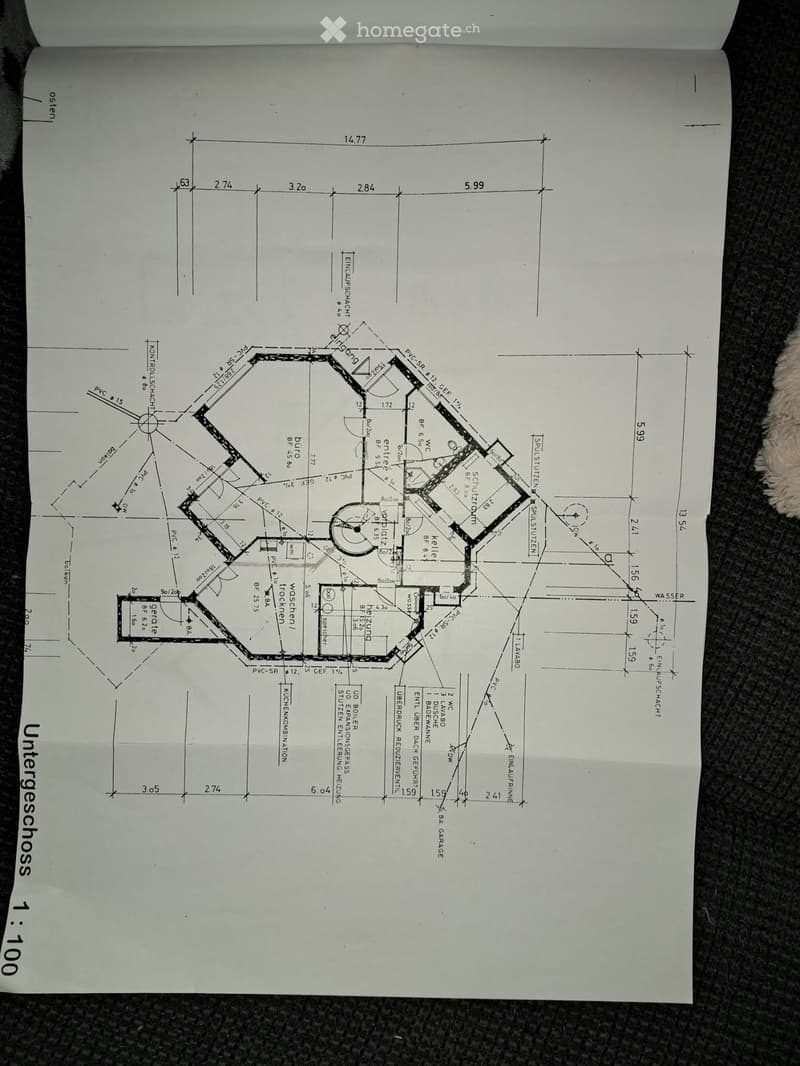 Floor plan of a basement level showing rooms labeled including kitchen, living room, bedrooms, and utility areas with measurements and technical details.