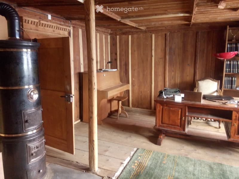 {"type": "Furnished Room", "objects": ["wooden desk", "chair", "stool", "stool", "stool", "stool", "stool", "stool", "stool", "stool", "stool", "stool", "stool", "stool", "stool", "stool", "stool", "stool", "stool", "stool", "stool", "stool", "stool", "st