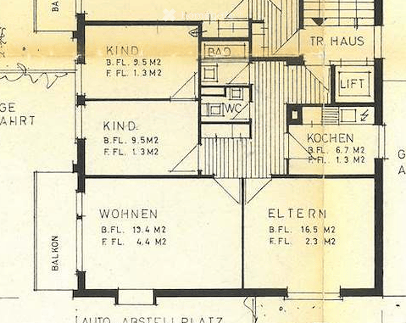 Floor plan of a house with four rooms: two bedrooms (KIND), a living room (WOHNEN), a parent's room (ELTERN), a kitchen (KOCHEN), a bathroom (BAD), and a hallway (TR HAUS).