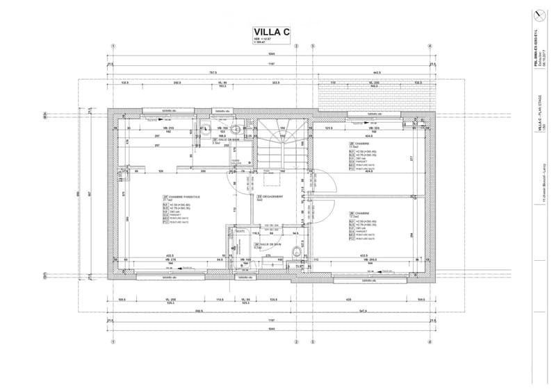 Floor plan of Villa C, showing layout with labeled rooms including living room, kitchen, bedrooms, bathrooms, and parking spaces.