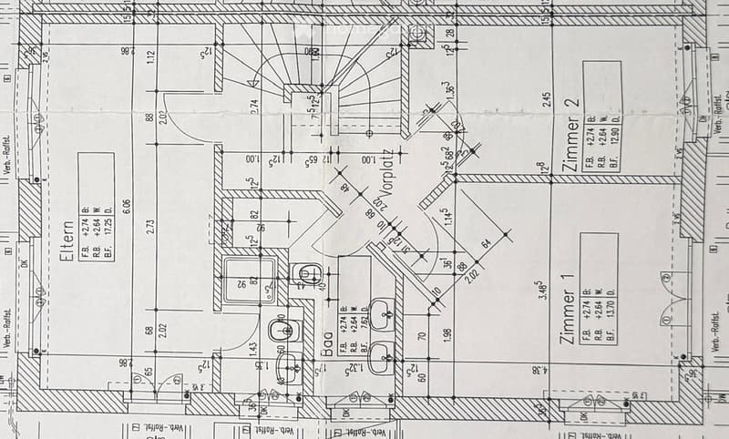 Floor plan showing a layout with labeled rooms and dimensions, including a living area, kitchen, and multiple bedrooms.