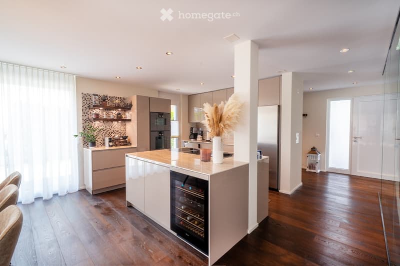 modern kitchen, island, wine cooler, granite countertop, stainless steel appliances, wooden floors, white cabinets