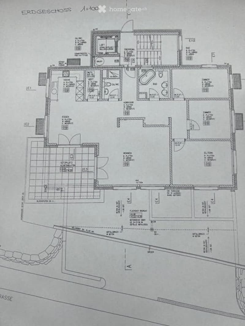 Floor plan of a multi-story building with labeled rooms including living room, kitchen, bedrooms, bathrooms, and additional spaces.