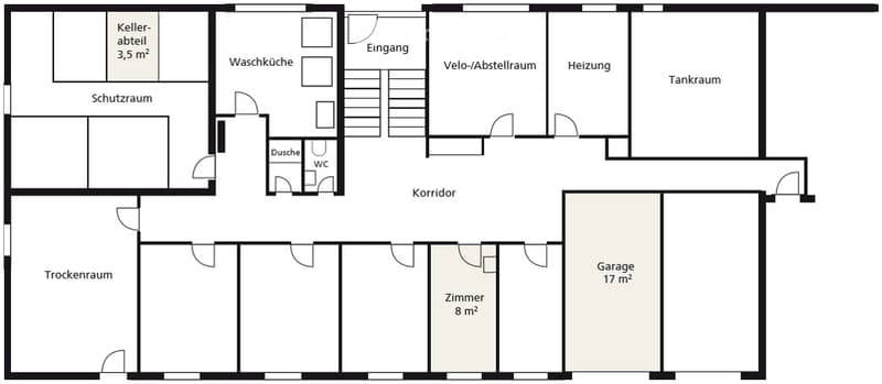 Floor plan of a basement level showing various rooms including a storage room, wash kitchen, entrance, bicycle/storage room, heating room, tank room, corridor, dry room, room, and garage.