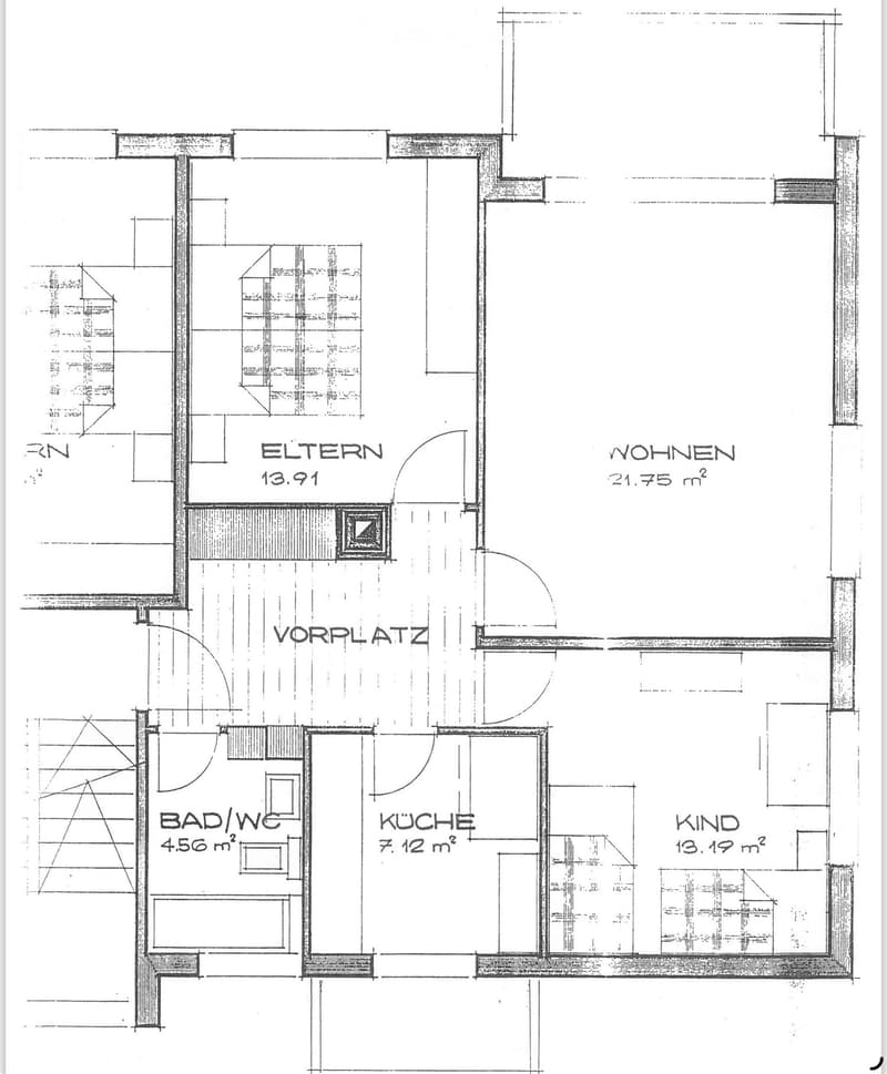 Floor plan showing a layout with labeled rooms: Eltern (13.91 m²), Wohnen (21.75 m²), Vorplatz, Bad/WC (4.56 m²), Küche (7.12 m²), and Kind (13.19 m²).