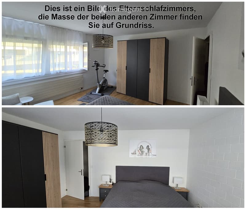 Modern bedroom with a large bed, nightstands, lamps, a wardrobe, an exercise bike, and a picture frame on the wall.