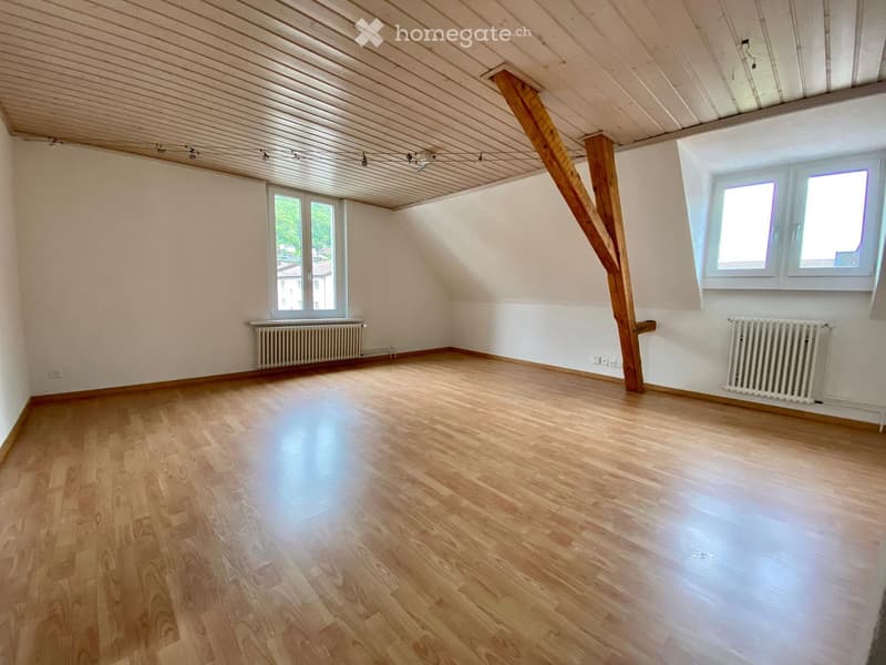 empty room, wooden floor, two windows, wooden beams