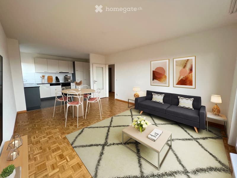 living area with sofa, dining table, kitchen area, rug, lamps, and a few decorative items