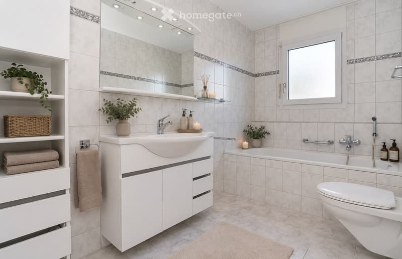 Modern bathroom with a white sink, bathtub, toilet, and large mirror. Shelves hold plants, towels, and decorative items.