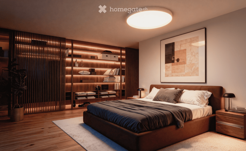 Modern bedroom with a large bed, nightstands, a bookshelf with integrated lighting, a framed artwork, and a plant in a basket. The room features warm lighting and wooden flooring.