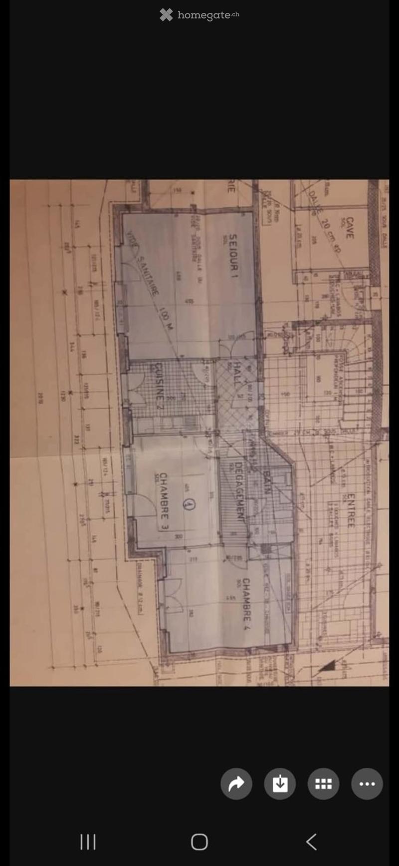 Floor plan of a house with labeled rooms including a kitchen, living room, and bedrooms.