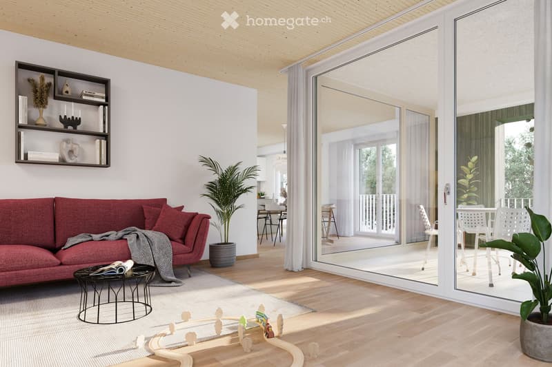 Modern living room with a red sofa, coffee table, bookshelf, and large sliding glass doors leading to a balcony area with outdoor furniture.