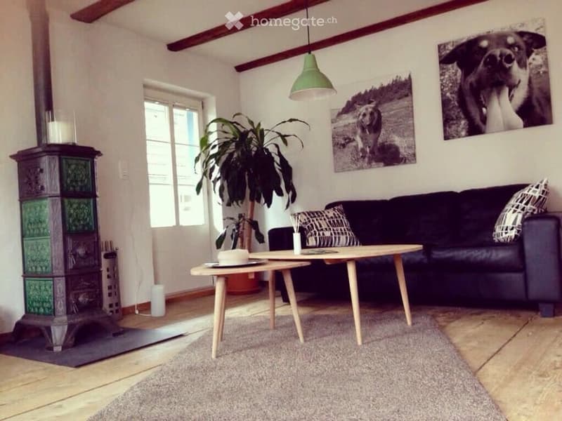 Wohnzimmer mit Kachelofen
