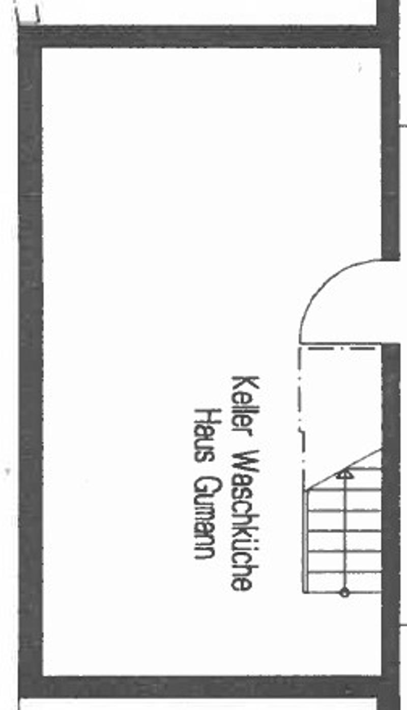 Floor plan showing a house with a kitchen, living room, and basement.